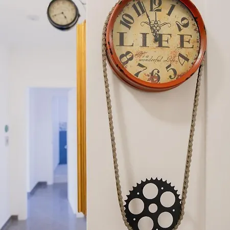 L'orologio Guest * Scalea
